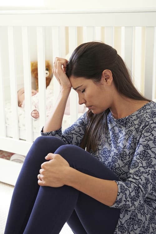 Frustrated Mother Suffering From Post Natal Depression