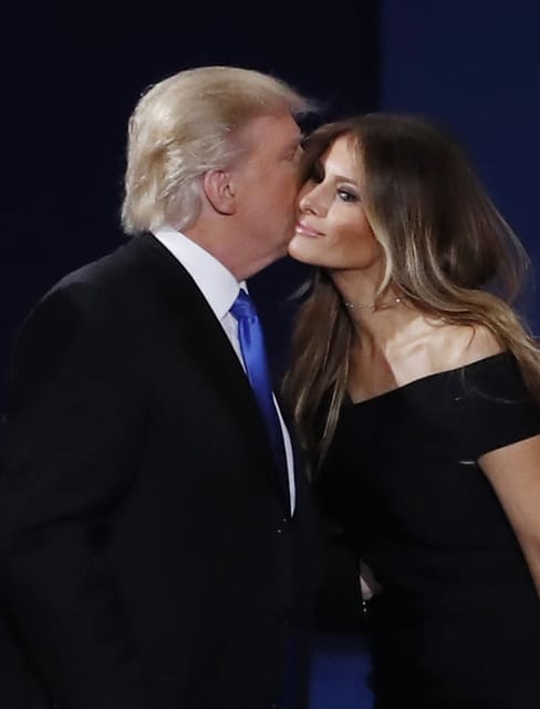 Republican Donald Trump kisses his wife Melania after a presidential debate with Democrat Hillary Clinton at Hofstra University in Hempstead, New York, September 26, 2016. Photo by John Angelillo/UPI Photo via Newscom